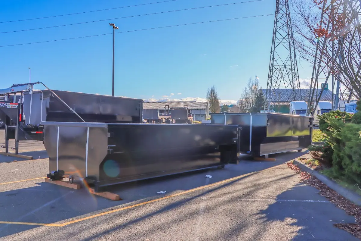 Roll-off dumpster ready for waste disposal at job site for Construction Dumpster Rental in Medford